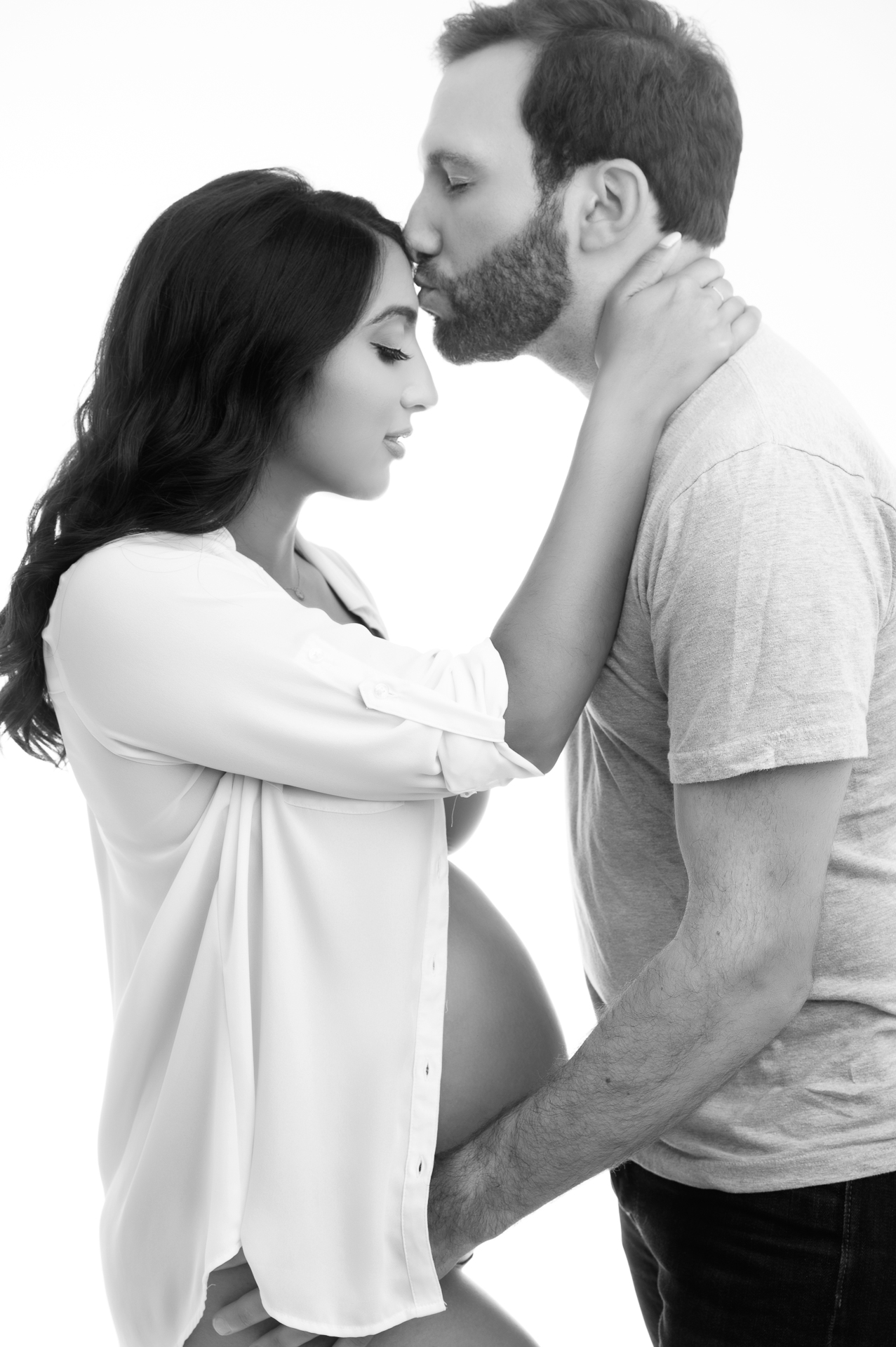 pregnant woman with her husband, black and white image